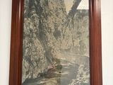 une image d'un tableau accroché au mur d'une pièce