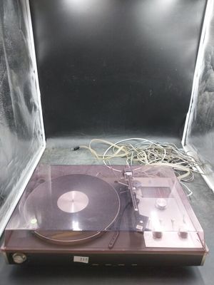a turntable with a record on it in a case