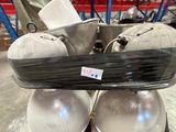 a large pile of metal balls on top of each other