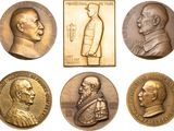 several different types of medals are shown on a white background
