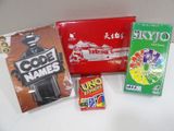three boxes of candy and a box of candy on a table