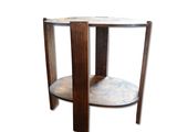 une image représentant une table ronde au plateau en marbre