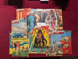 de nombreuses bandes dessinées exposées sur une table
