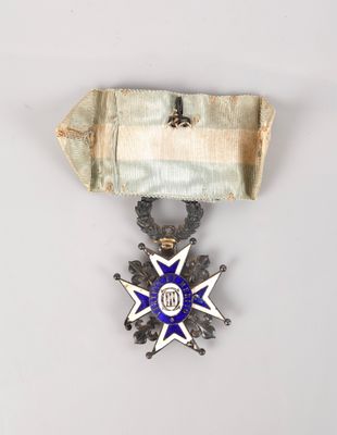 l'image d'une médaille portant une étoile
