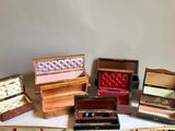 a lot of small wooden boxes sitting on a table