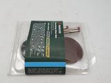 a package of sanding discs on a white surface