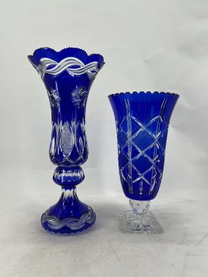 pair of cobalt blue glass vases with etched designs on the sides