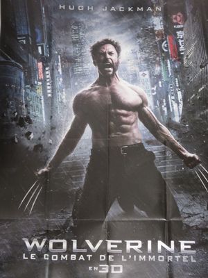 L'affiche du film « Wolverine » est accrochée au mur.