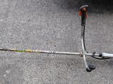 a close up view of a string trimer on the ground
