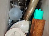 a cardboard box filled with assorted items in it
