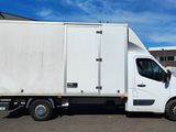 a white truck that is parked in a parking lot