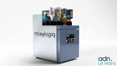 an image of a vending machine with drinks on top of it