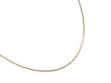 a close up of a gold chain necklace on a white background