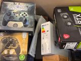 a box with a game controller sitting on top of a table