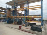 a large warehouse with a lot of pallets on it