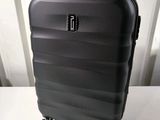 a piece of luggage sitting on a white table