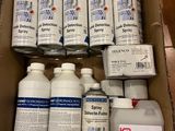 a box full of different types of sprays in it