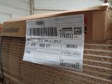 a cardboard box with a barcode on it sitting on a pallet