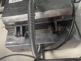 a metal device that is sitting on top of a table