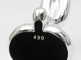 an image of a silver apple shaped object on a white background