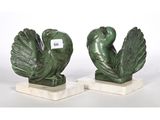 pair of green bird bookends on marble bases
