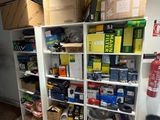a room with a lot of boxes and boxes on the shelves