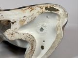 porcelain figurine of a horse with a white body and brown head