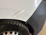 a sticker on the side of a car with a sticker on it