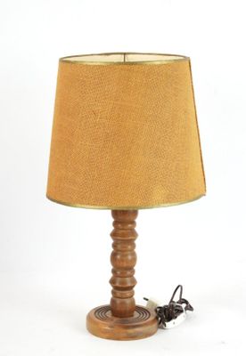 an image of a table lamp with a brown shade on top of it