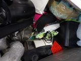 a pile of assorted items sitting on a table