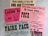 several old french movie posters are displayed on a refrigerator door