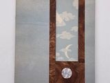 a picture of a clock hanging on a wall