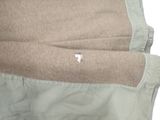 a close up of a person ' s pants with a small patch in the pocket