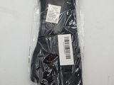 a close up of a pair of black tights in a plastic bag