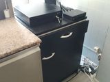 an image of a kitchen with a sink and a stove