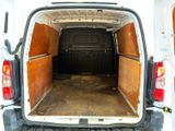a white van with the back door open and the back door open