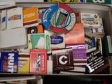 a box full of various types of cigarettes and other items