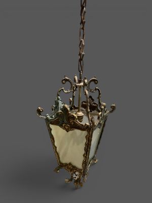 an image of a light hanging from a ceiling with a chain