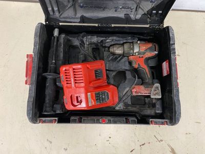 a tool box with a drill and a hammer inside of it
