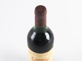 a bottle of wine that is sitting on a table