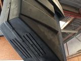 a large piece of metal that is on top of a stand