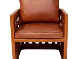 an image of a brown leather chair on a white background