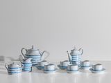 service à thé à rayures bleues et blanches, avec tasses et soucoupes assorties
