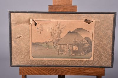 a picture of a painting on an easel with a bird flying over it