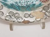 a decorative plate with a floral design on it
