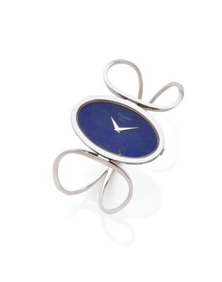 an image of a close up of a wrist watch with a blue dial