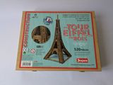 a cardboard box with a picture of the eiffel tower in it