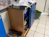 a kitchen with a blue cabinet and a blue refrigerator