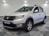 the front view of a white dacia parked on a checkered floor