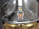 a close up of a helmet with a crest on it